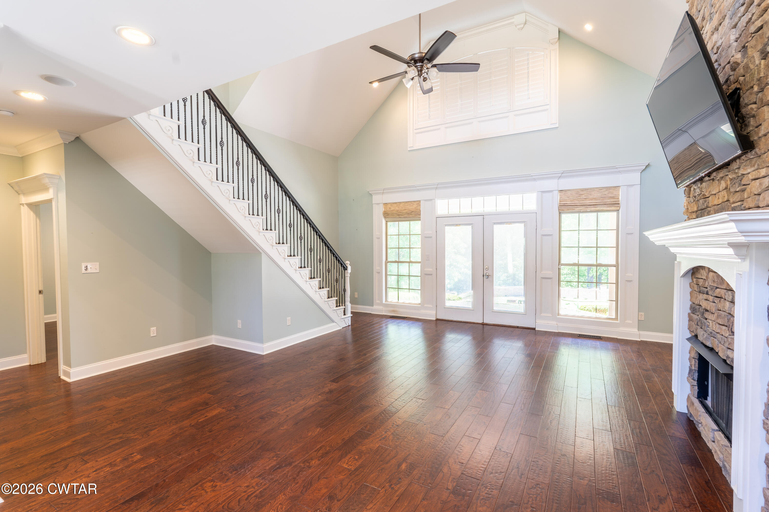 227 Willie Johnson Road Dyersburg, TN 38024 - Photo 7 of 43 a view of empty room with wooden floor and fan