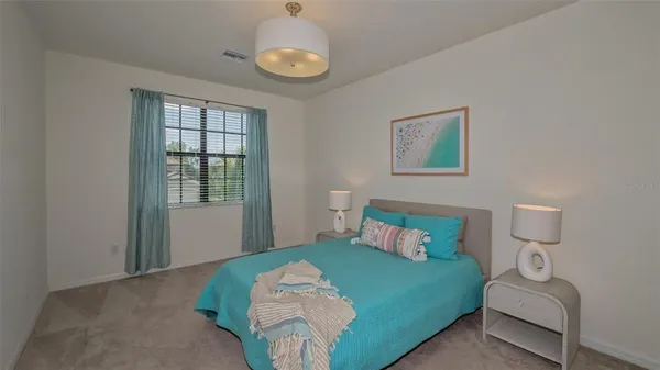 a view of a house with a swimming pool and a yard