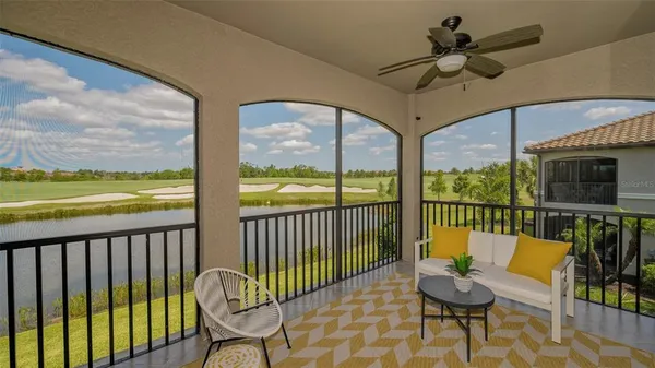 an aerial view of a house yard swimming pool and outdoor seating