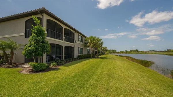 a view of a swimming pool and a lake