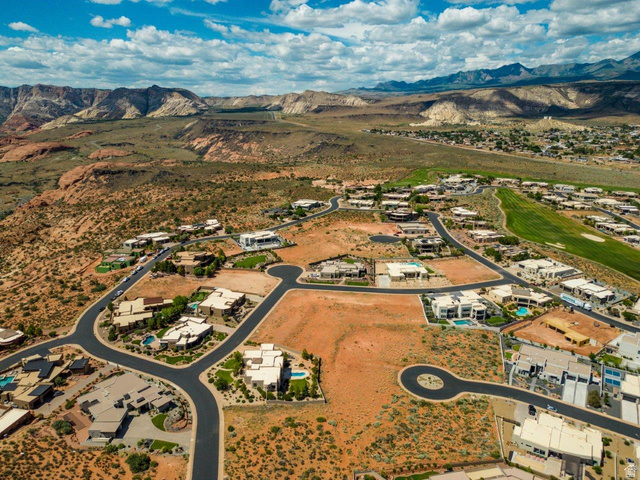 Basalt Cir Street, Unit 1027 St. George, UT 84770 - Photo 29 of 29 Aerial view of property's location with a mountainous background and nearby suburban area
