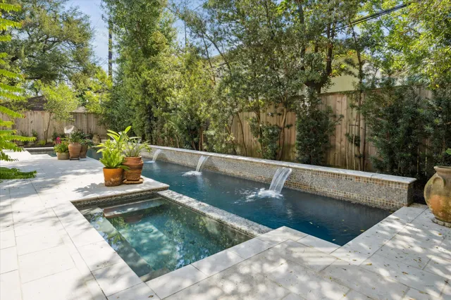 a view of a swimming pool with a sitting area