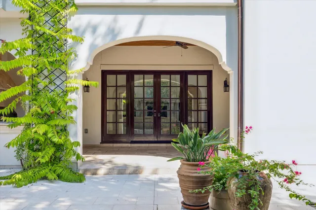 a front view of a house with a glass door
