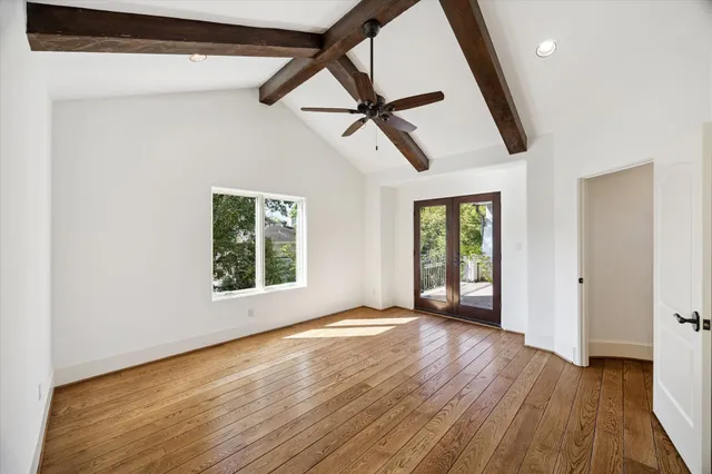 a view of living room with furniture and a chandelier