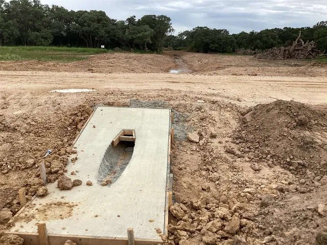 a view of lake with green space