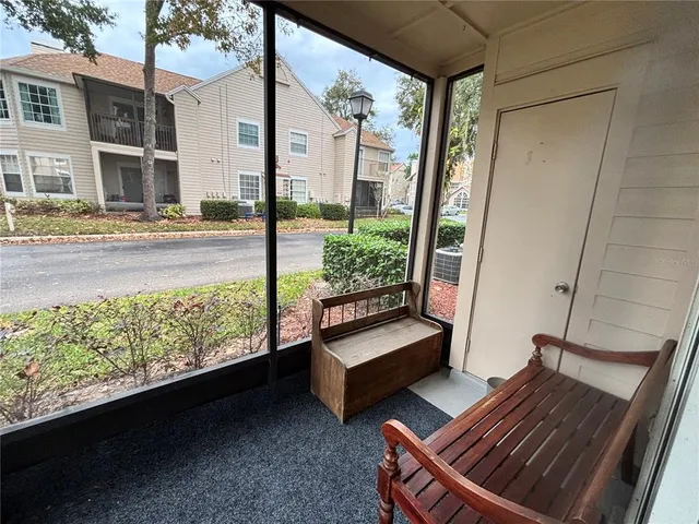 a view of swimming pool with outdoor seating