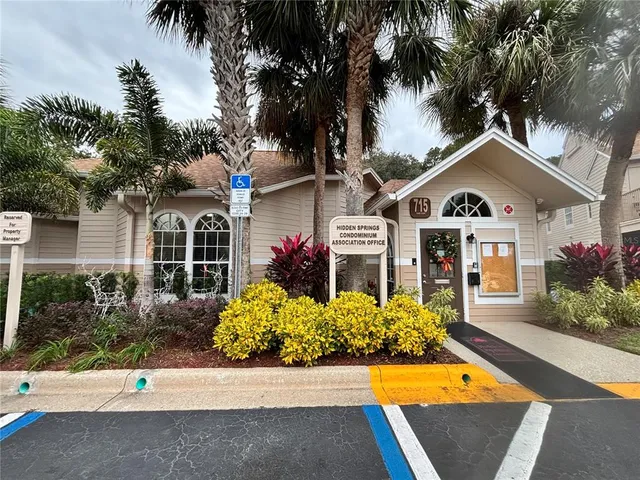 a front view of a house with yard