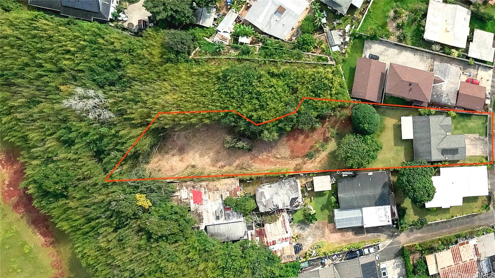 95-246 Wailawa Street Mililani, HI 96789 - Photo 1 of 14 an aerial view of a house with a yard and a large tree