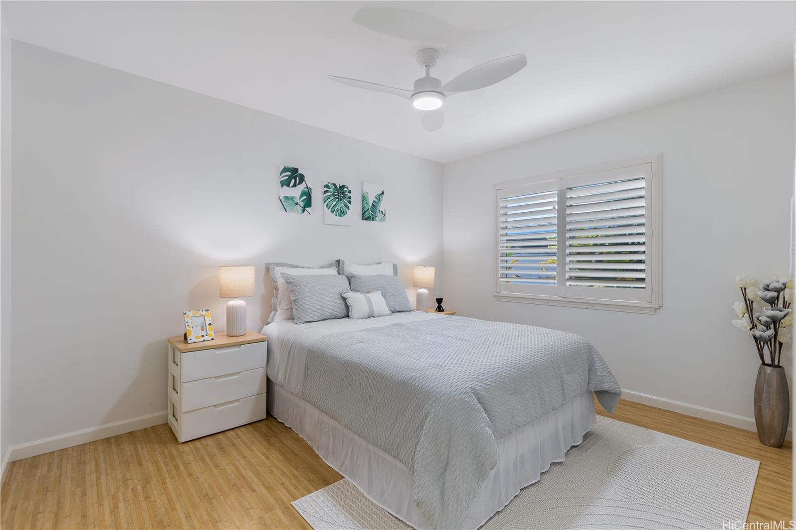 95-246 Wailawa Street Mililani, HI 96789 - Photo 11 of 14 a bedroom with a bed and a window