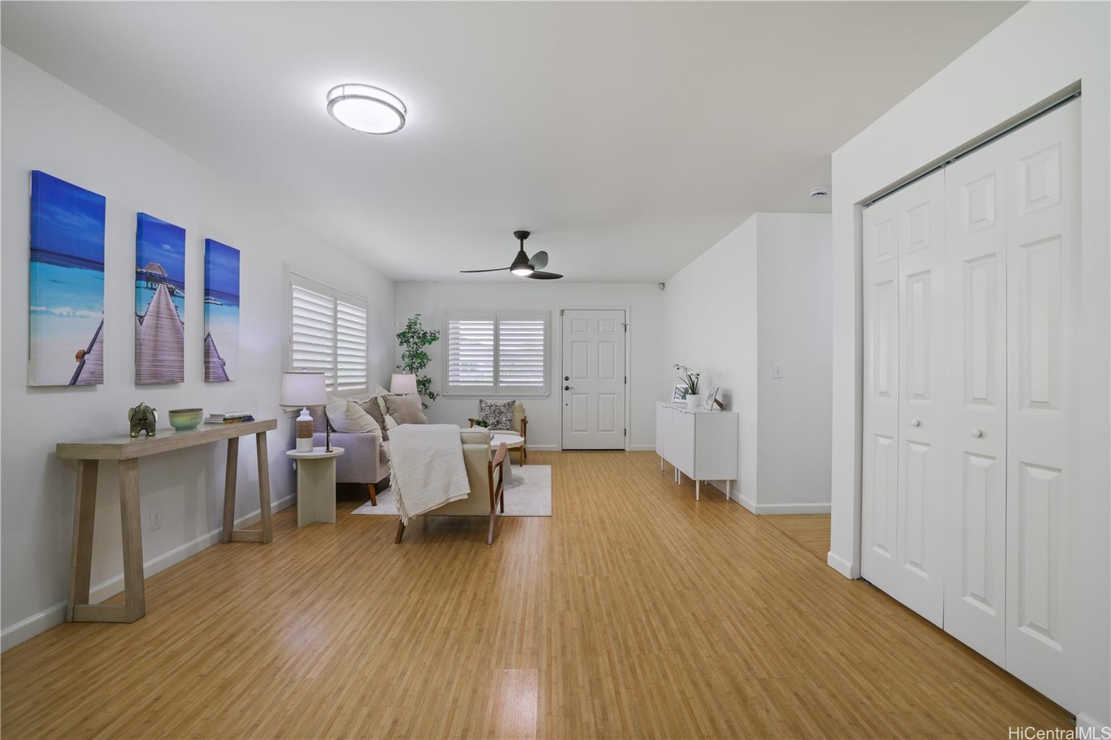 95-246 Wailawa Street Mililani, HI 96789 - Photo 7 of 14 a view of a living room and dining room