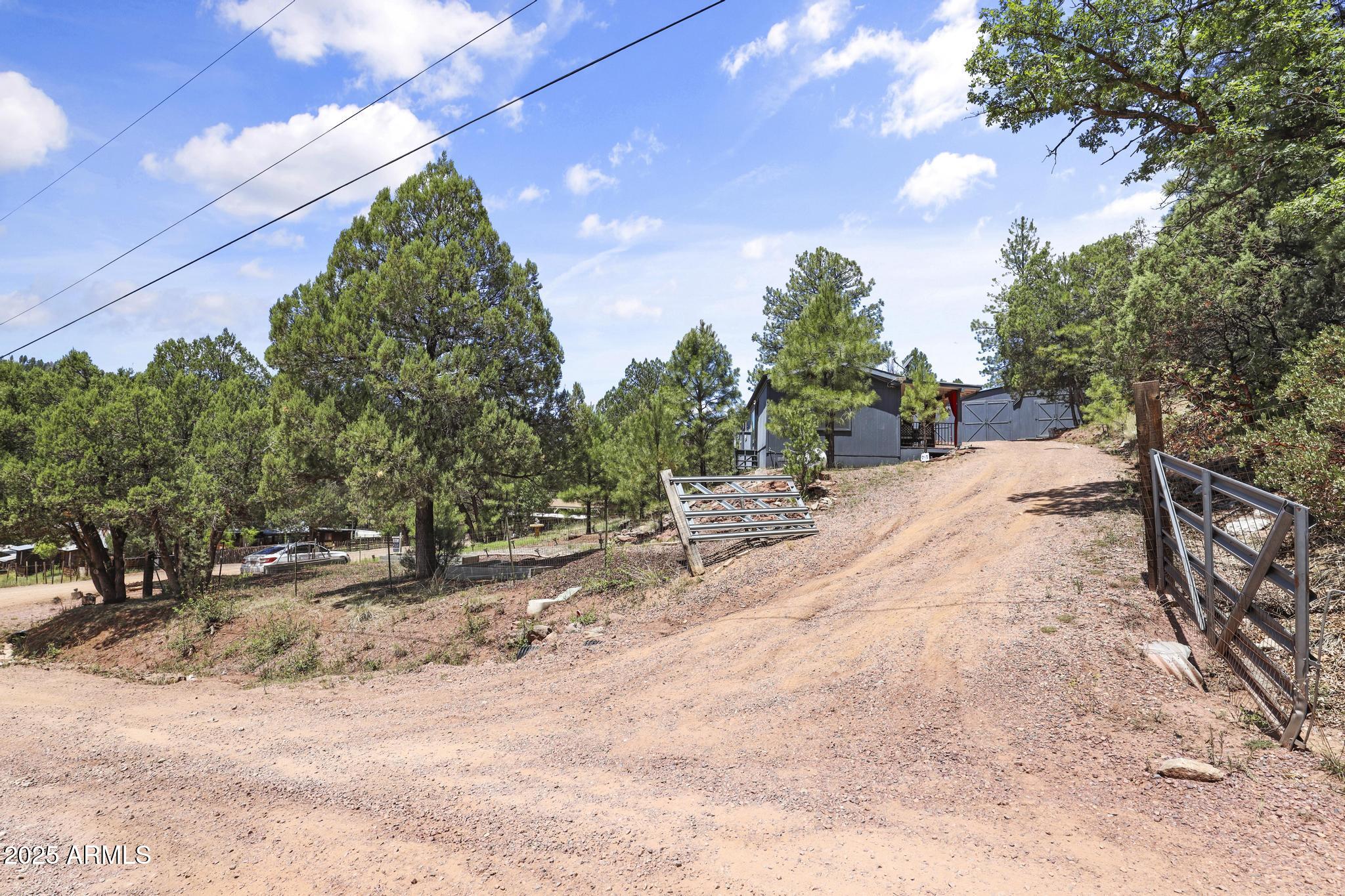 254 Blackfoot Road Payson, AZ 85541 - Photo 24 of 31 a view of backyard of a house