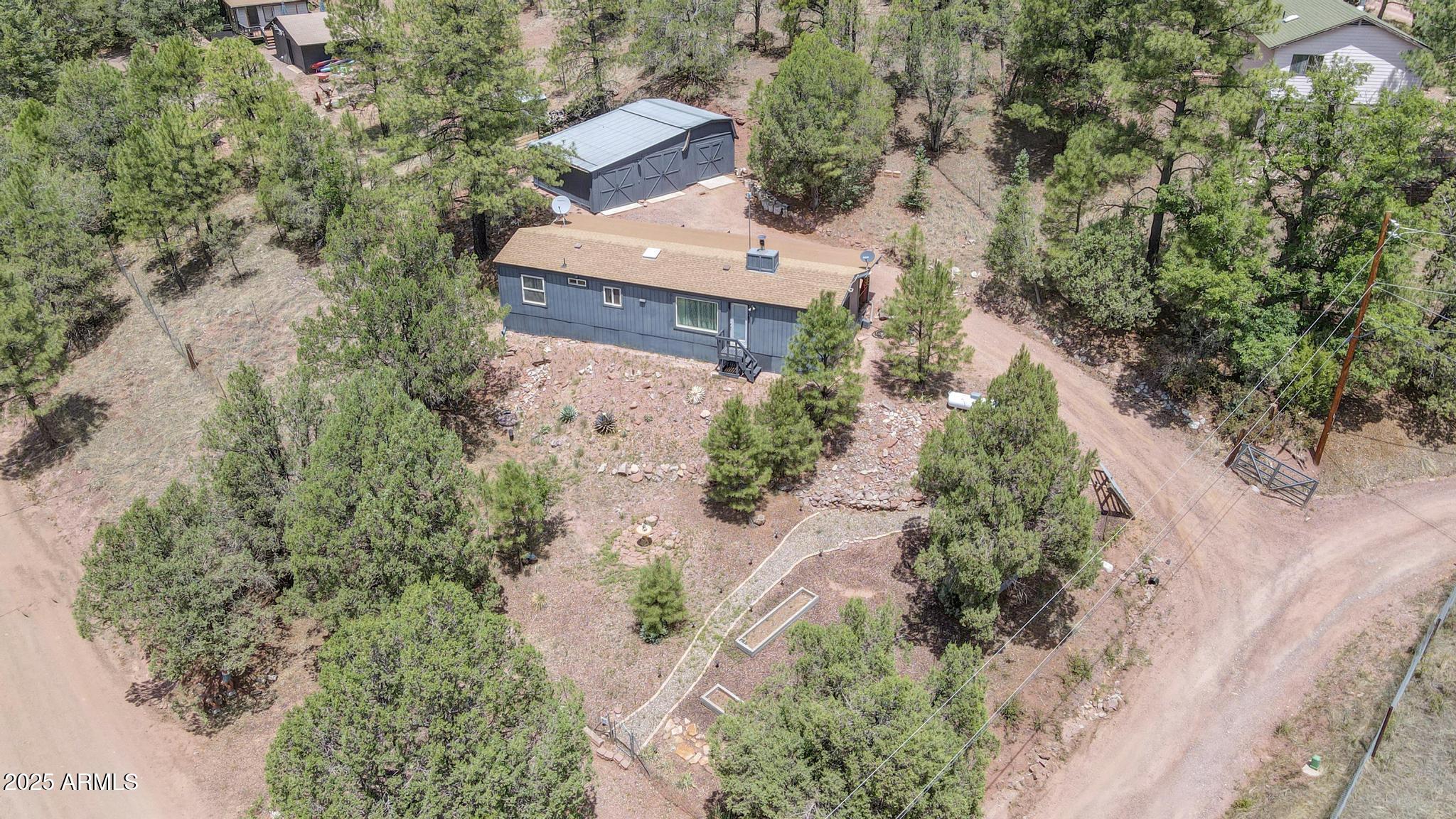 254 Blackfoot Road Payson, AZ 85541 - Photo 28 of 31 an aerial view of a house with a yard