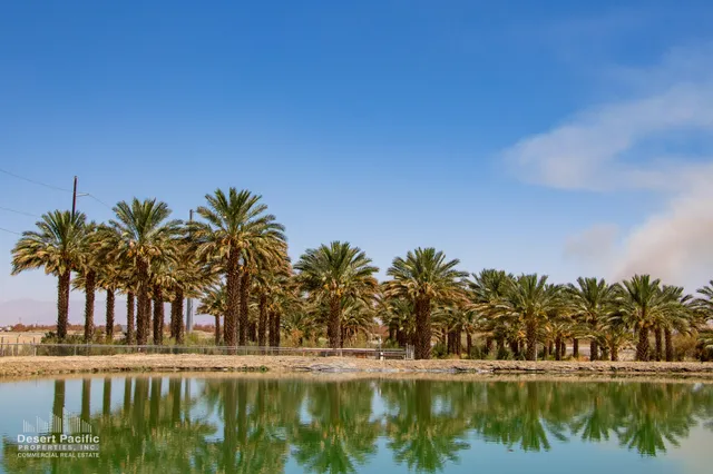 a view of lake with a house in the background