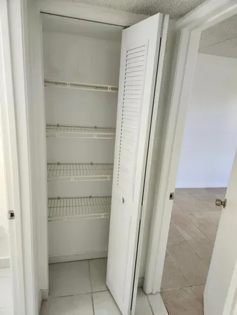 $1,750 | 600 Village Green Court, Unit 108, Palm Springs, FL 33461