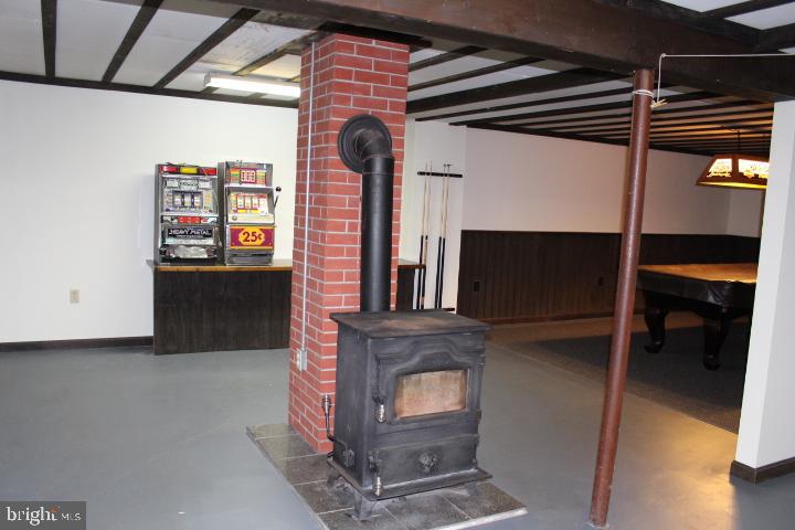 462 Shirktown Road Narvon, PA 17555 - Photo 27 of 37 Coal stove supplements the heat