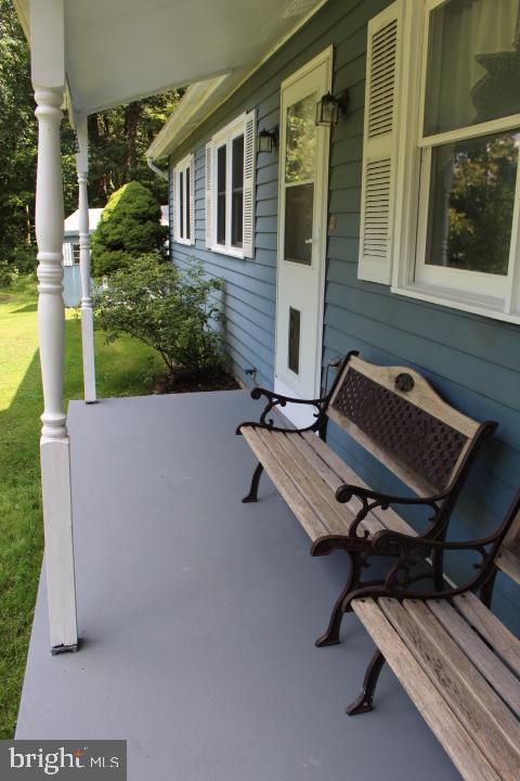 462 Shirktown Road Narvon, PA 17555 - Photo 33 of 37 Front porch includes benches