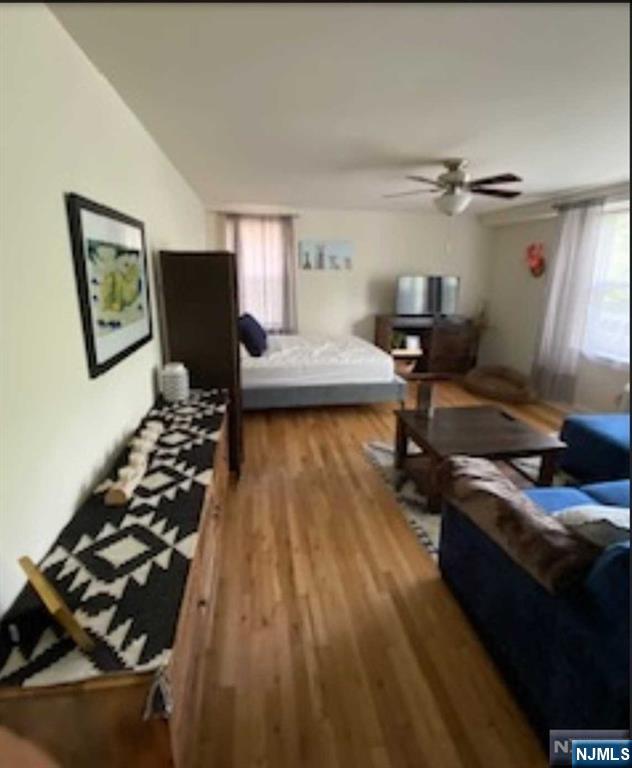 280-320 Oak Street, Unit 306TG Ridgewood, NJ 07450 - Photo 12 of 22 a bedroom with furniture and a rug