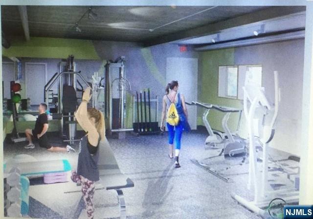 280-320 Oak Street, Unit 306TG Ridgewood, NJ 07450 - Photo 19 of 22 a view of a room with gym equipment