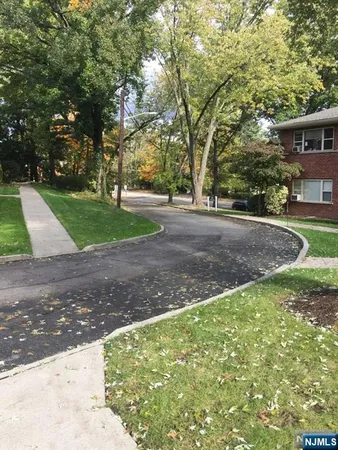 a view of backyard with green space