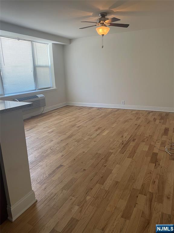 280-320 Oak Street, Unit 306TG Ridgewood, NJ 07450 - Photo 5 of 22 an empty room with windows