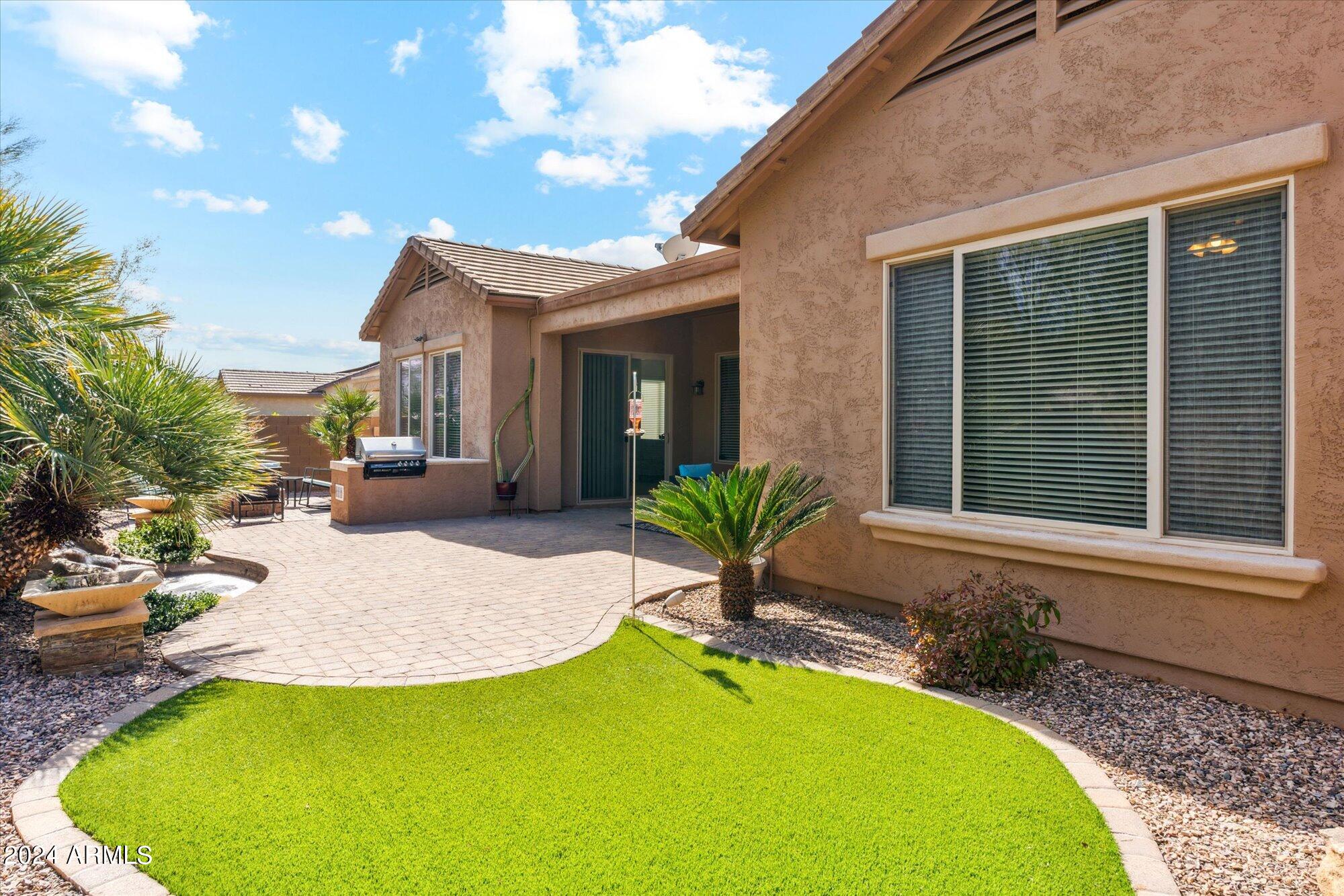 3307 North Riverside Drive Florence, AZ 85132 - Photo 2 of 35 a view of a house with swimming pool and porch