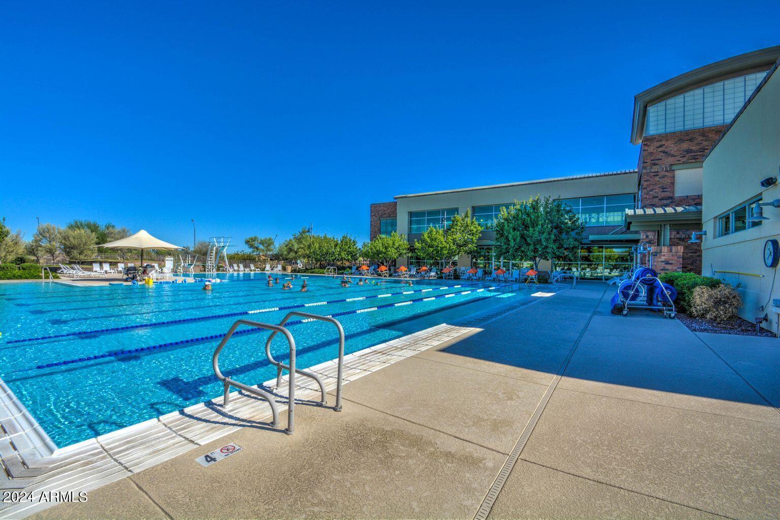 3307 North Riverside Drive Florence, AZ 85132 - Photo 22 of 35 a view of swimming pool outdoor seating and city view