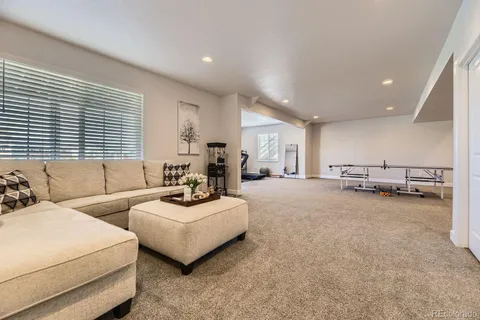 a living room with furniture and a couch
