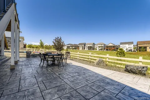 a view of a terrace with chairs