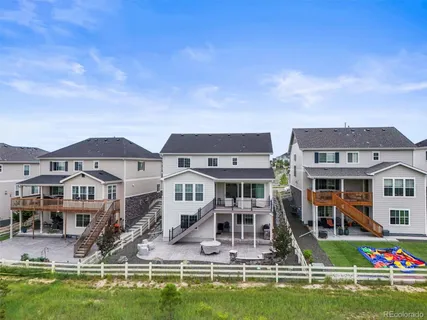 a house with swimming pool in front of it