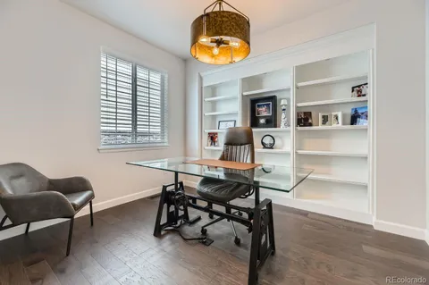 a workspace with furniture and window