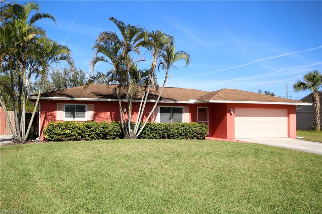 4553 30th Place Southwest Naples, FL 34116 - Photo 1 of 19 Sitting Pretty for Just for You!