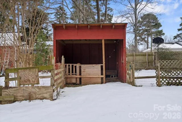 a view of street with a large tree