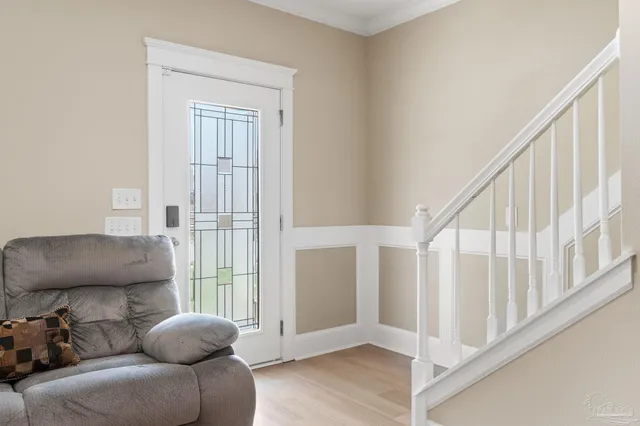 a view of livingroom with furniture and stairs