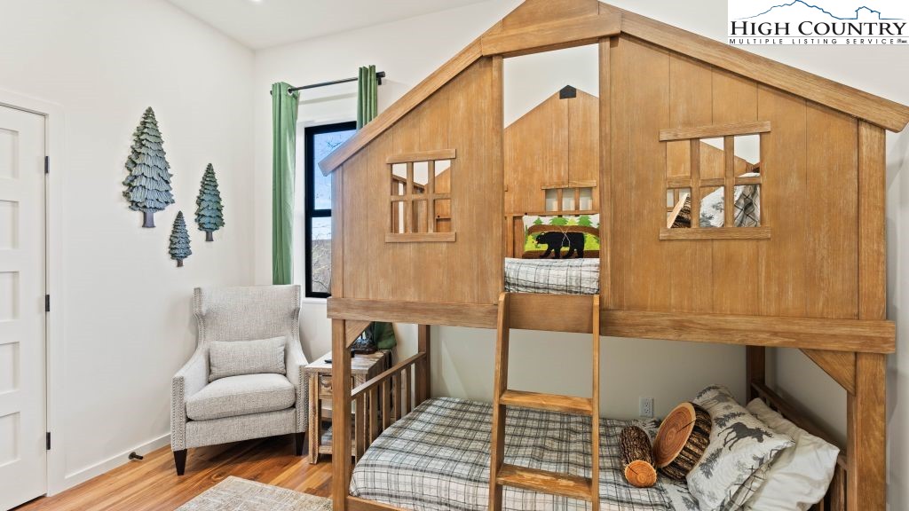 114 Windridge Road Beech Mountain, NC 28604 - Photo 21 of 49 a balcony with furniture and window