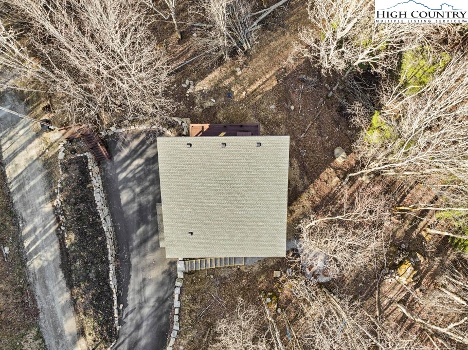 114 Windridge Road Beech Mountain, NC 28604 - Photo 34 of 49 front view of a house with a trees