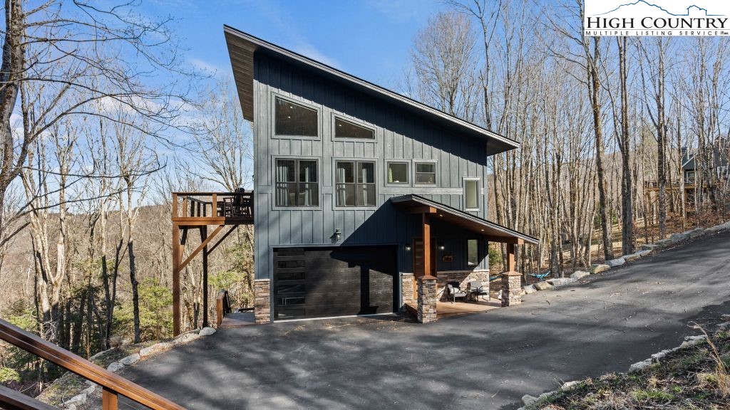 114 Windridge Road Beech Mountain, NC 28604 - Photo 44 of 49 a view of a car park in front of house