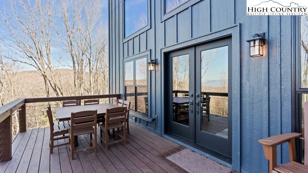 114 Windridge Road Beech Mountain, NC 28604 - Photo 49 of 49 a view of balcony and deck with furniture