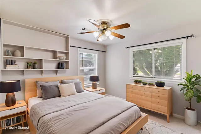 a bathroom with a sink a vanity and a toilet
