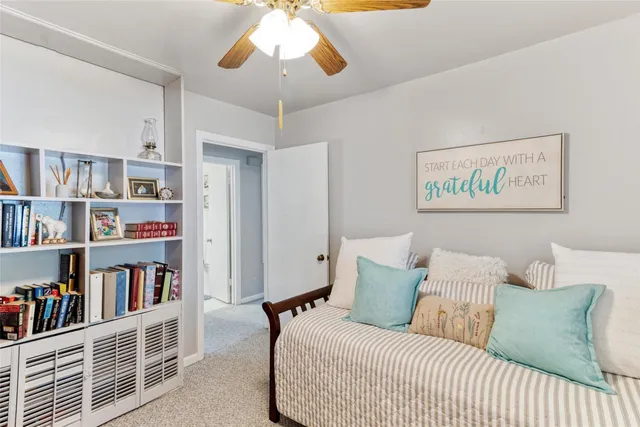 a bathroom with a sink toilet and a mirror