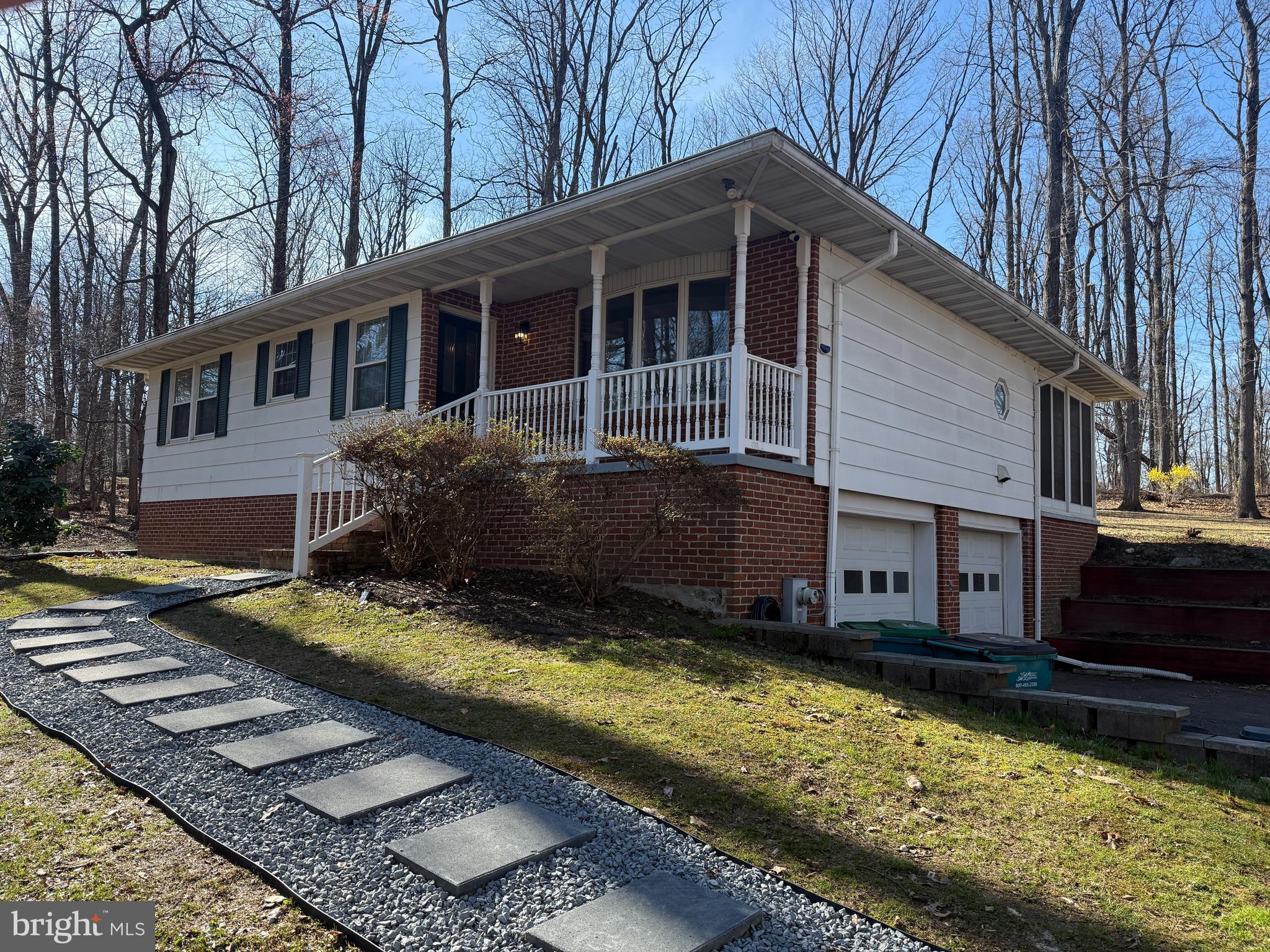 a view of house with yard