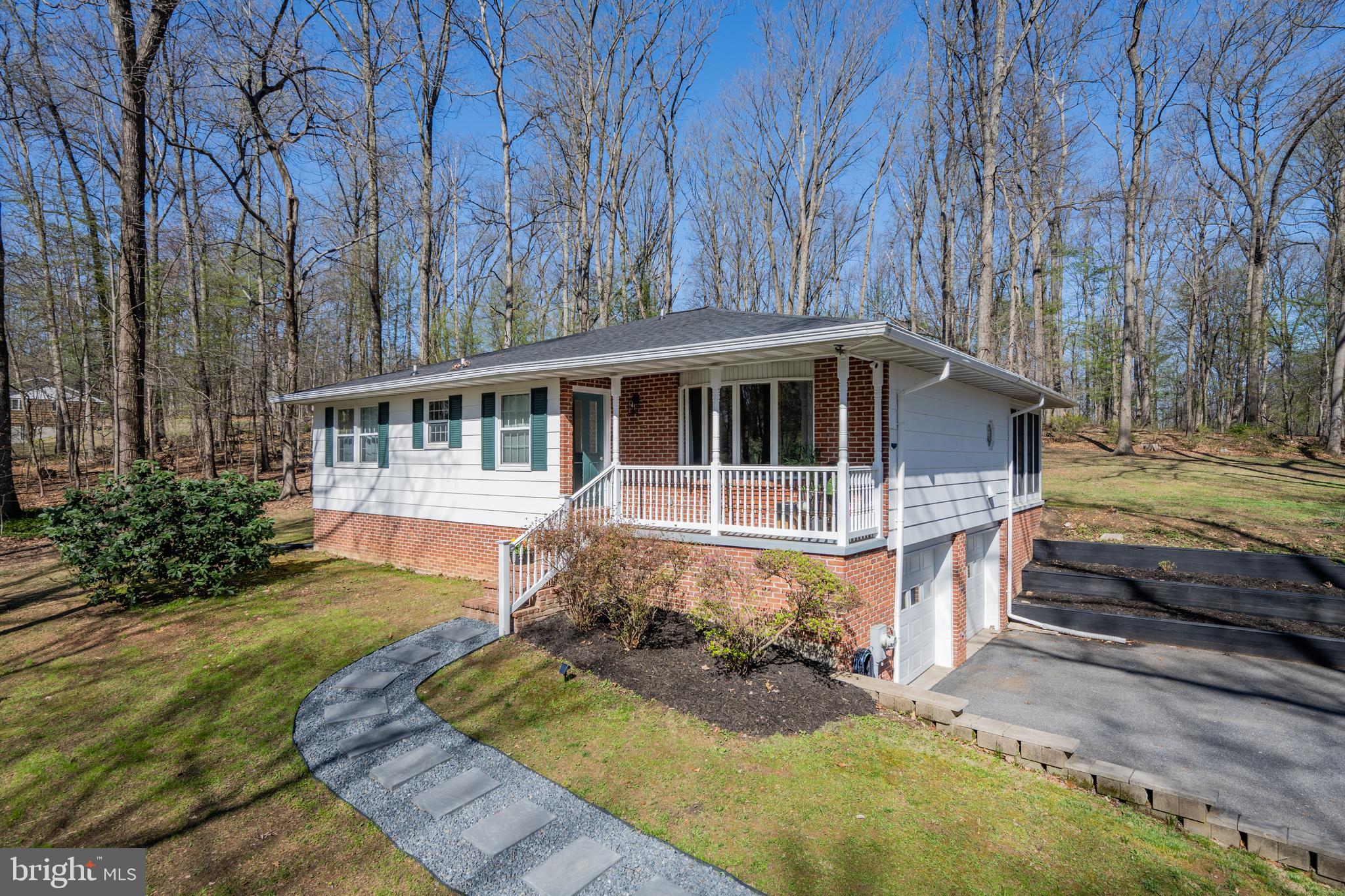 932 Western Chapel Road Westminster, MD 21157 - Photo 2 of 48 front view of a house with a yard