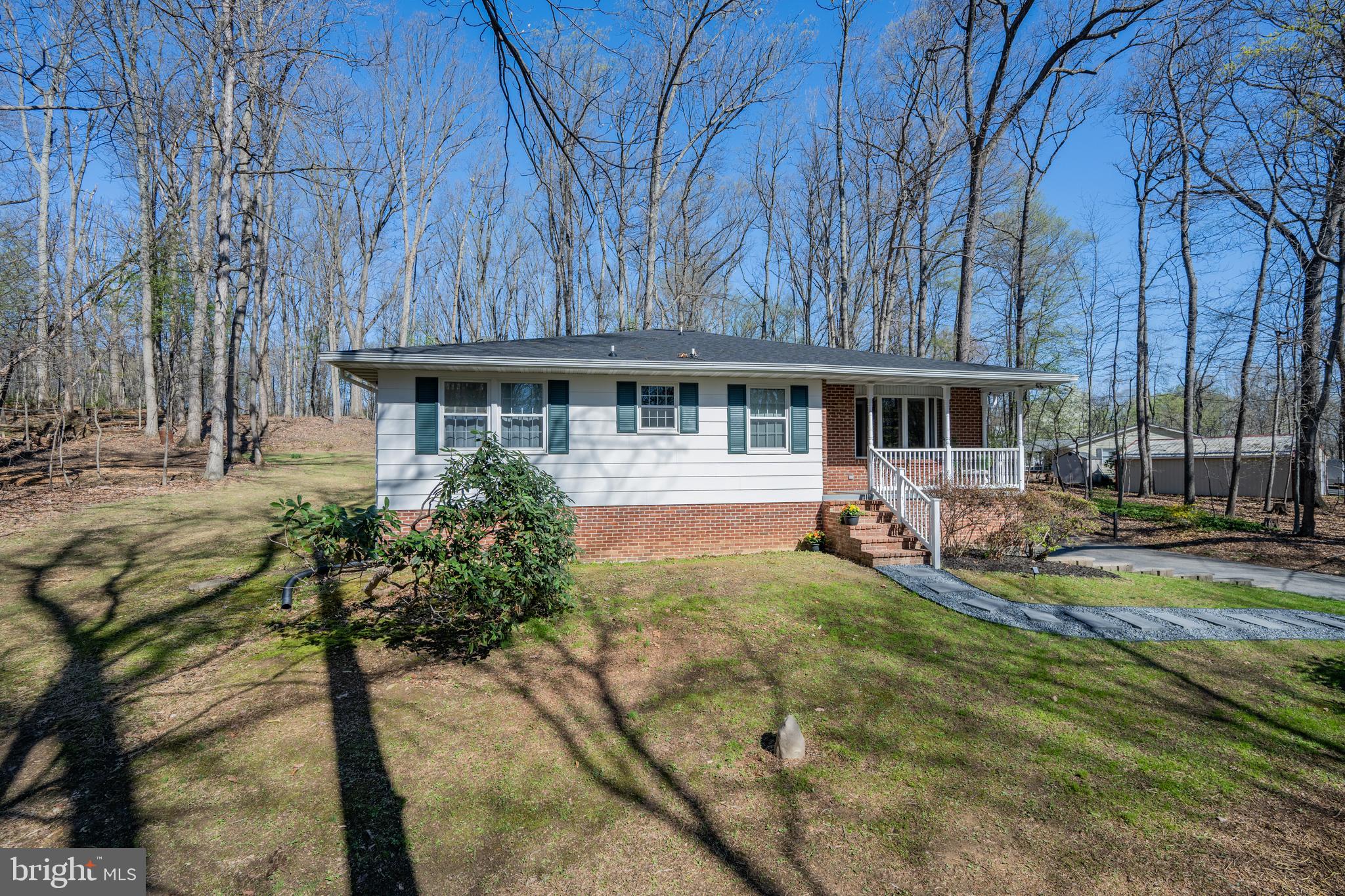932 Western Chapel Road Westminster, MD 21157 - Photo 3 of 48 a view of a house with backyard porch and sitting area