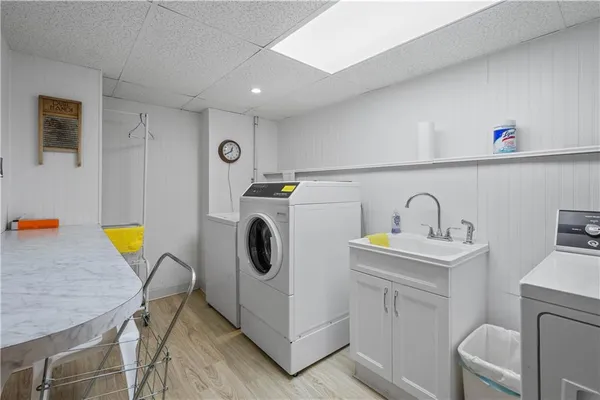 a utility room with dryer and washer