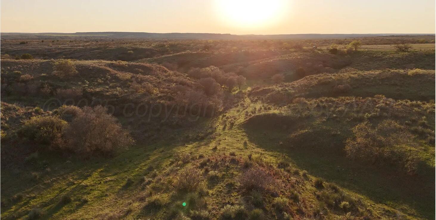 a view of a lake from a mountain