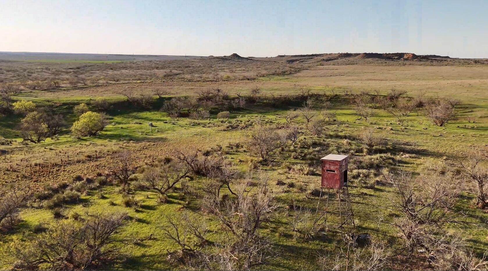 90 Co Road Memphis, TX 79245 - Photo 3 of 7 a view of a lake with a mountain