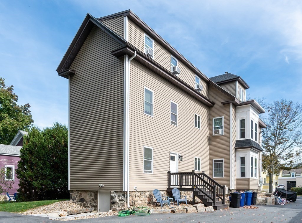 8 Putnam Street, Unit 3 Danvers, MA 01923 - Photo 28 of 32 a front view of a building with street
