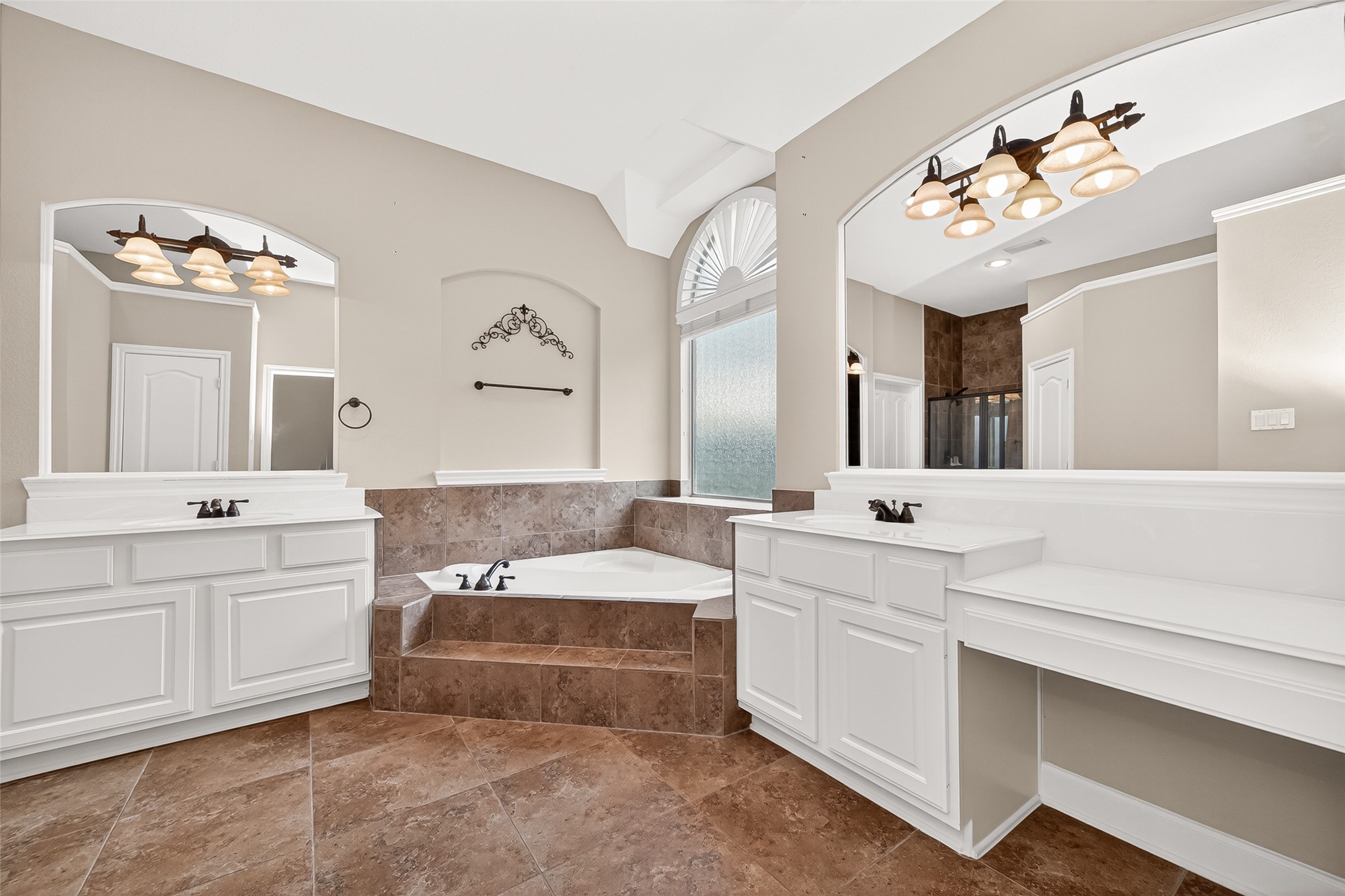 2310 Spring Lake Park Lane Spring, TX 77386 - Photo 39 of 47 a spacious bathroom with a double vanity sink mirror and bathtub