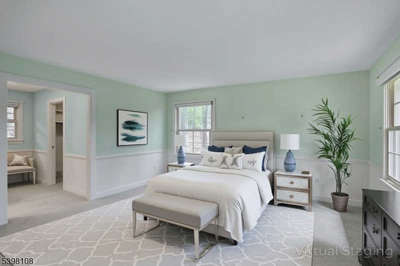 14 William Barnes Road Flemington, NJ 08822 - Photo 12 of 31 a bedroom with a large bed and a potted plant