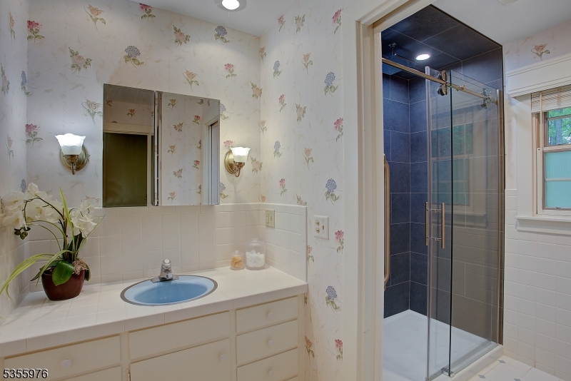 14 William Barnes Road Flemington, NJ 08822 - Photo 14 of 31 a bathroom with a sink and a mirror