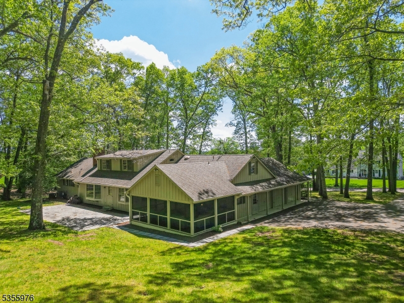 14 William Barnes Road Flemington, NJ 08822 - Photo 29 of 31 a white house with a big yard and large trees